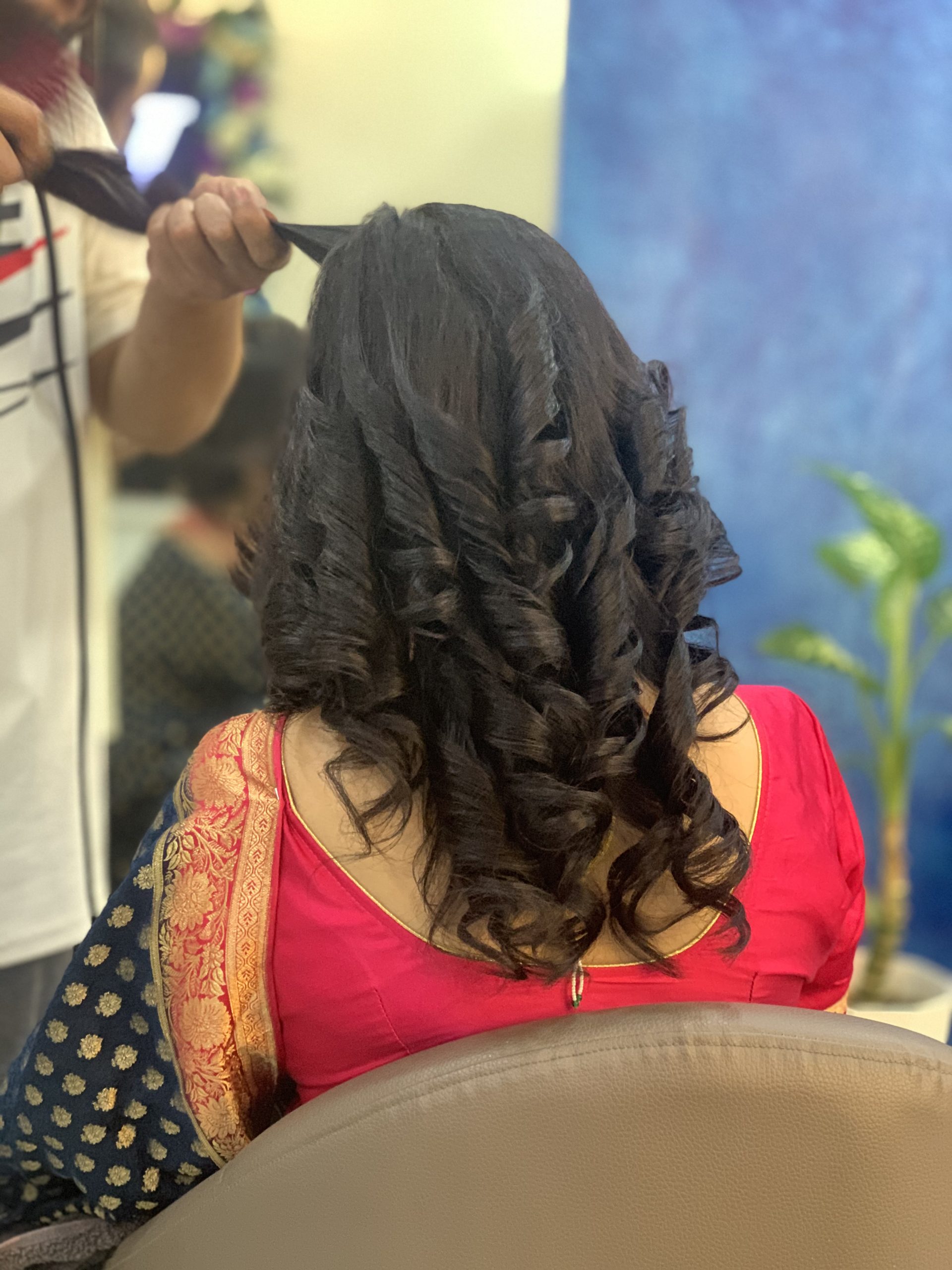 "Hair Stylish styling clients curly hair"