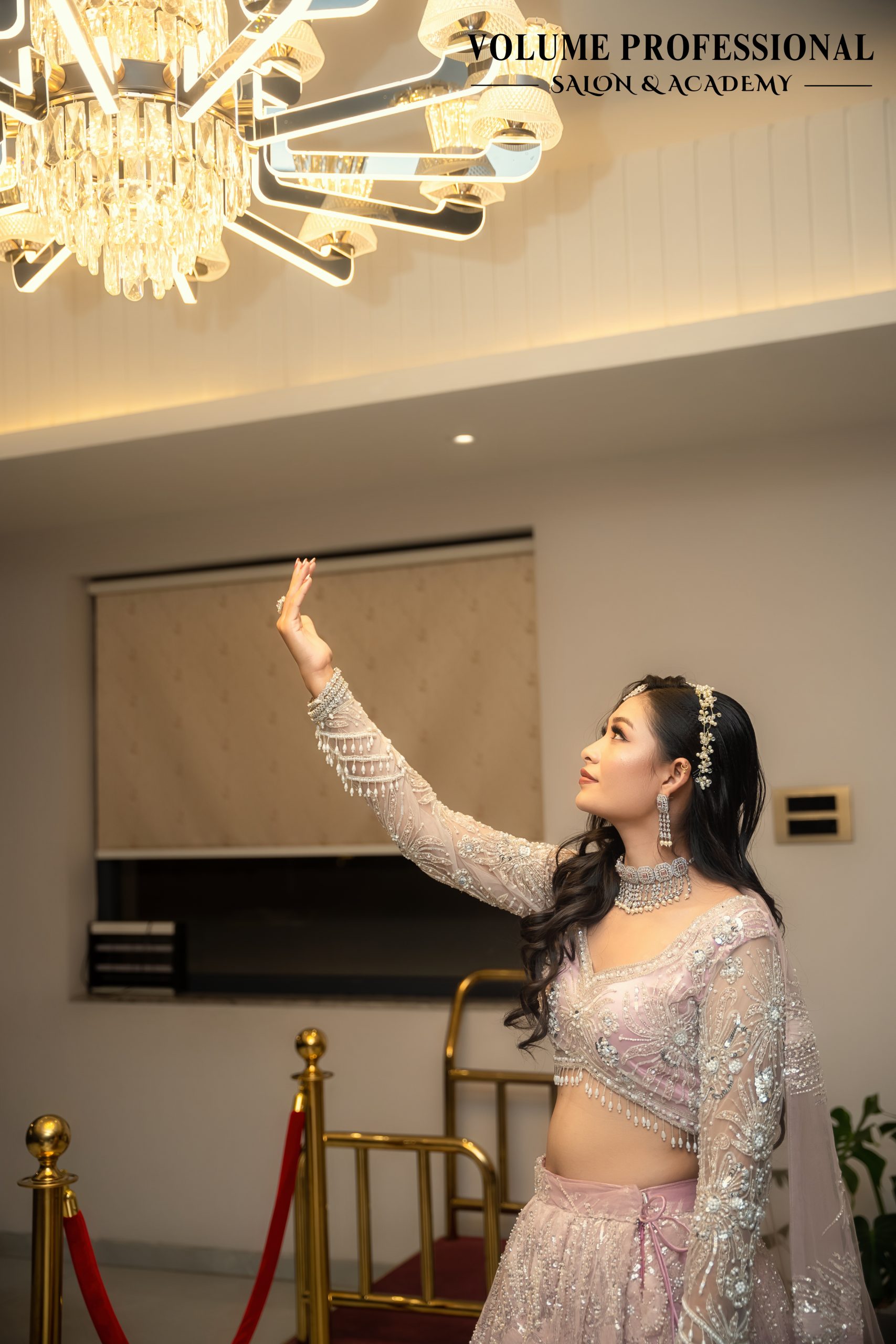 Luxury bridal makeup look with detailed lehenga and accessories